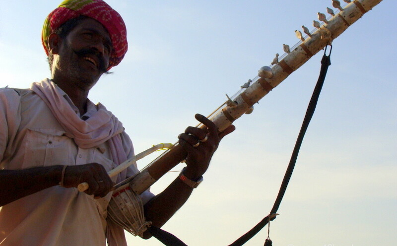 Man Playing Ravanhatta at Pushkar Fair 2011 (Rajasthan, India)