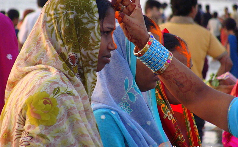 Woman Applying Vermillion - Chhath Festival, Juhu Beach, Mumbai, Maharashtra, India