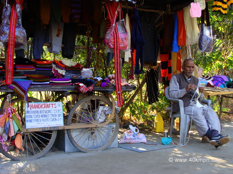 Man Knitting Sweater at Ganga Lane, Swarg Ashram, Rishikesh, Uttarakhand, India