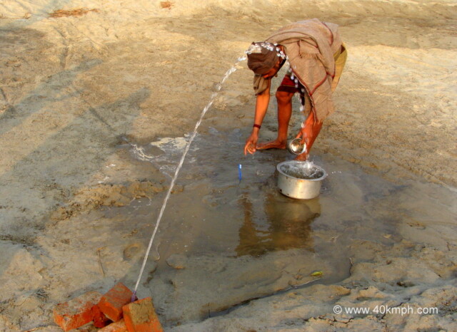 Different Way to Save Water for Brushing Teeth at Maha Kumbh Mela - 2013, Allahabad, Uttar Pradesh, India