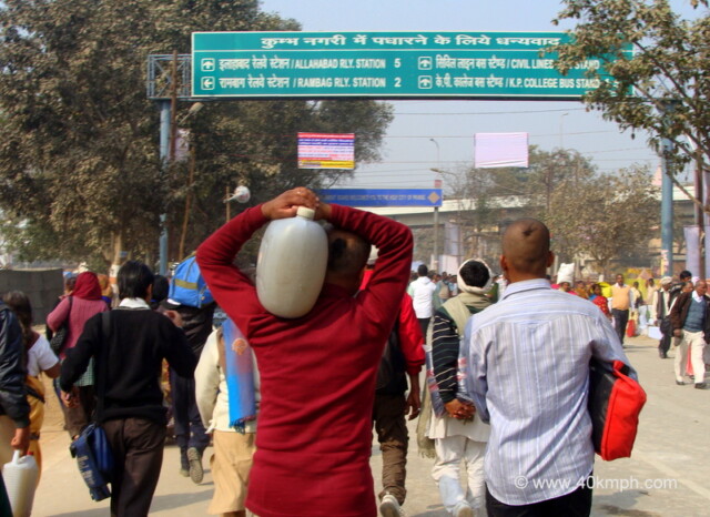 Kumbh Mela Devotee Carrying Holy Ganga Water at Kumbh Mela 2013, Allahabad, Uttar Pradesh, India