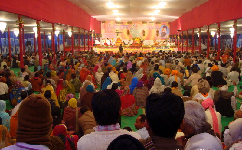 Kumbh Mela Devotees Listening to Shrimad Bhagavad Gita at Kumbh Mela 2013, Allahabad, Uttar Pradesh, India