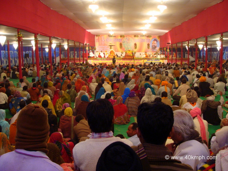 Kumbh Mela Devotees Listening to Shrimad Bhagavad Gita at Kumbh Mela 2013, Allahabad, Uttar Pradesh, India
