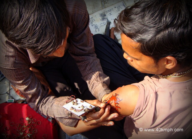 Making Tattoo with Traditional Machine in Barsana, Uttar Pradesh, India