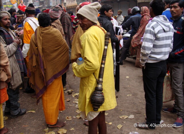 Man Carrying Gada at Dashashwamedh Ghat road, Varanasi, Uttar Pradesh, India