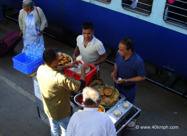 Vendor Serving Rabri at Abu Road Railway Station, Rajasthan, India