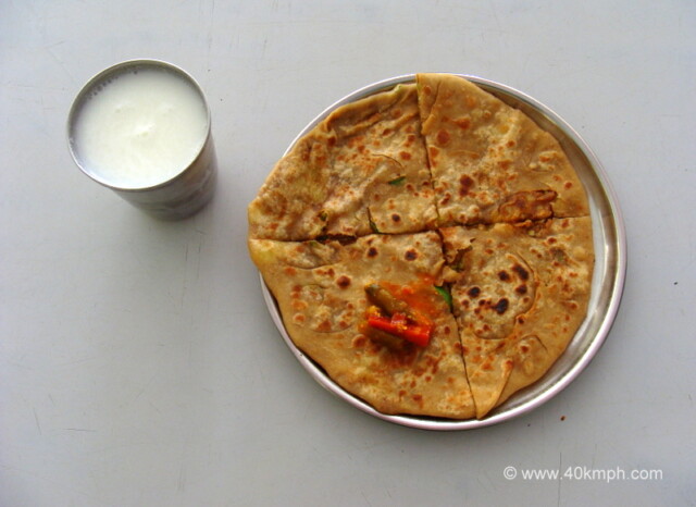 Aaloo Paratha with Chaas for Breakfast in a canteen at Shree Swaminarayan Temple, Mount Abu, Rajasthan, India