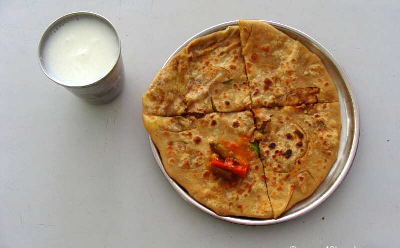 Aaloo Paratha with Chaas for Breakfast in a canteen at Shree Swaminarayan Temple, Mount Abu, Rajasthan, India