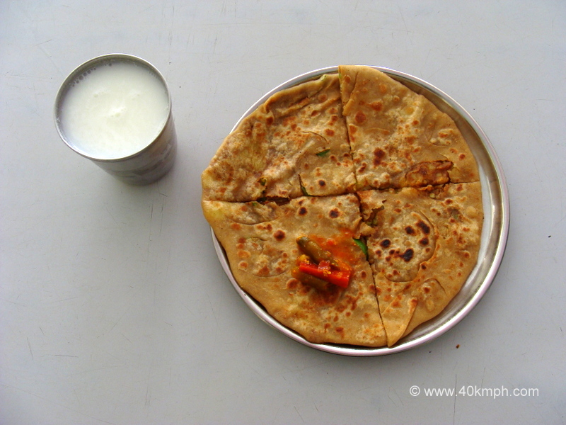 Aaloo Paratha with Chaas for Breakfast in a canteen at Shree Swaminarayan Temple, Mount Abu, Rajasthan, India