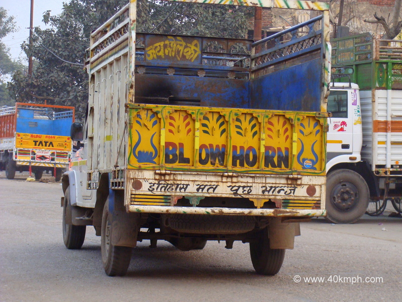 Quote Behind Lorry About Leaving Past History at Kosi Kalan, Mathura, Uttar Pradesh, India