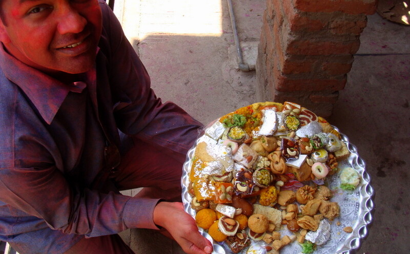 Sweets for Friends during Holi Festival in Barsana, Uttar Pradesh, India