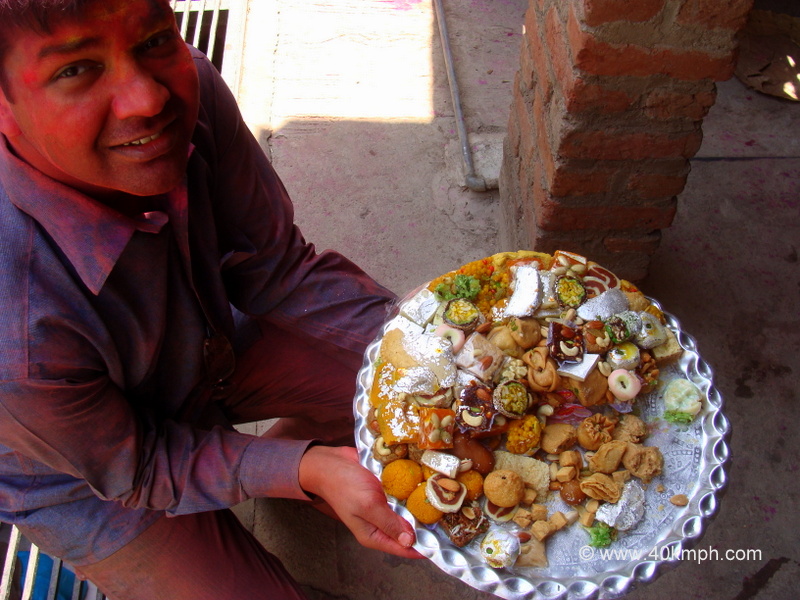 Sweets for Friends during Holi Festival in Barsana, Uttar Pradesh, India