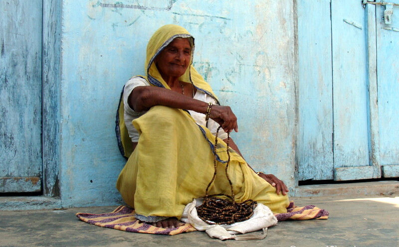 Woman Chanting Japa on 1108 Beads Mala in Barsana, Uttar Pradesh, India