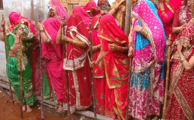 Huriyarine with Wooden Sticks during Lathmar Holi at Nandgaon, Uttar Pradesh, India