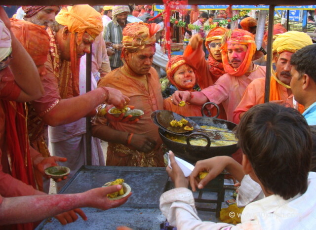 Snack Break for Huriyare during Lathmar Holi at Nandgaon, Uttar Pradesh, India
