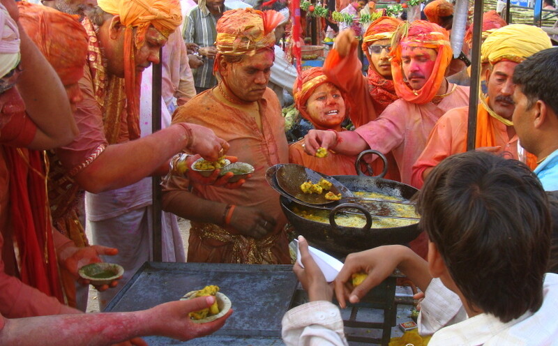 Snack Break for Huriyare during Lathmar Holi at Nandgaon, Uttar Pradesh, India