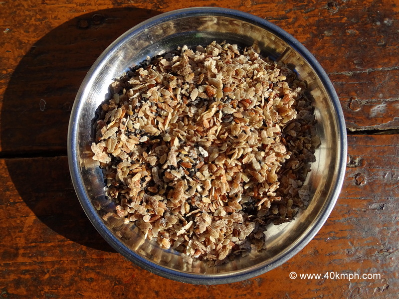 Flattened Rice (Chiwda) mixed with Black Seasame Seeds and Sugar