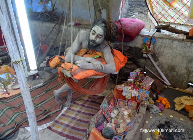 Naga Baba Standing on One Leg (Hatha Yoga), Bhavnath Fair 2015, Junagadh, Gujarat, India