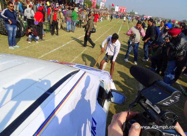 Pulling Car with Teeth at 79th Kila Raipur Sports Festival 2015 in Punjab, India
