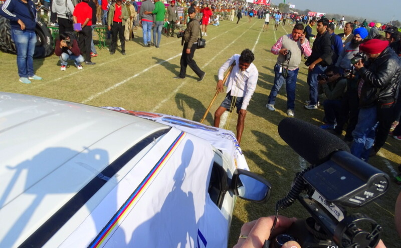 Pulling Car with Teeth at 79th Kila Raipur Sports Festival 2015 in Punjab, India