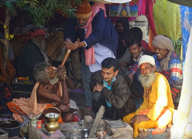 Sadhu Smoking Chillum at Bhavnath Fair 2015 in Junagadh, Gujarat, India