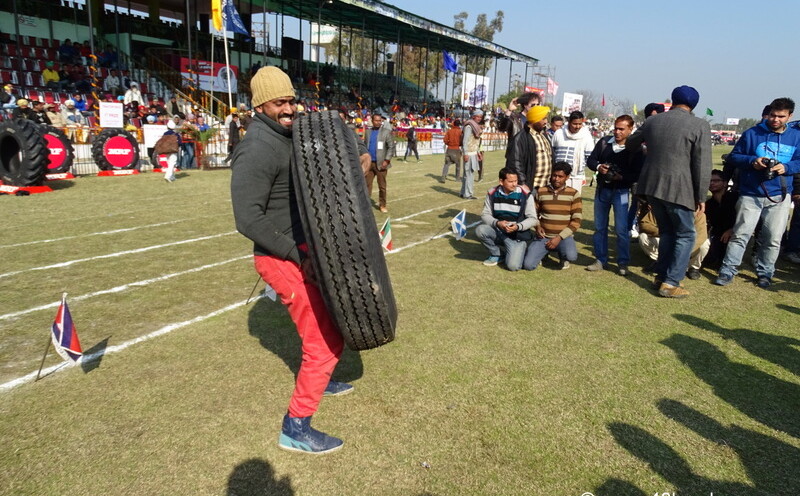 Tractor Tyre Lifting Competition at Kila Raipur Sports Festival 2015 in Punjab, India