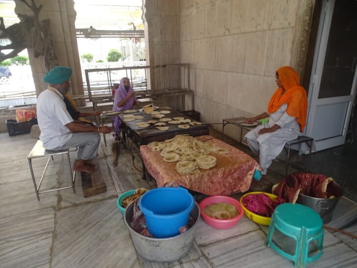 Gurudwara Sis Ganj Sahib (Chandni Chowk Road, Old Delhi, India) Volunteers Making Rotis at Community Kitchen
