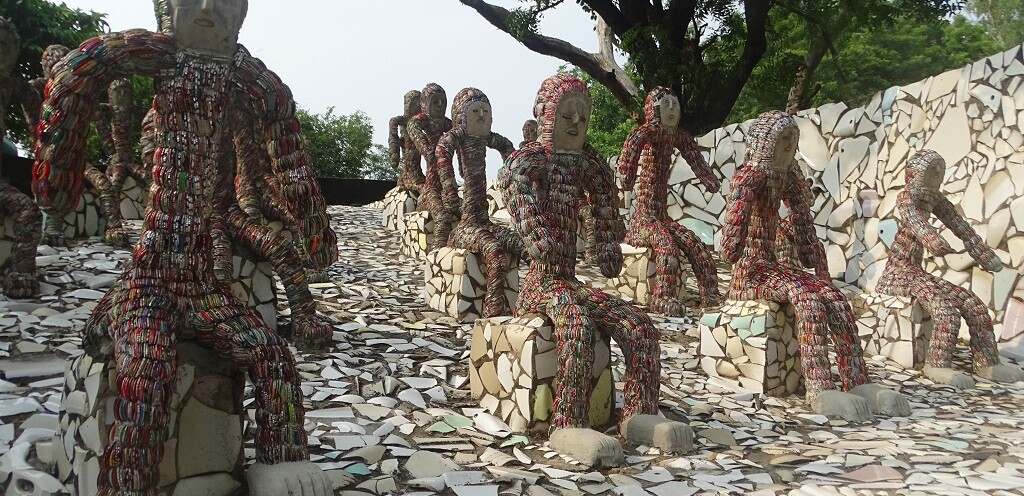 Sitting Sculptures Made from Broken Bangles at Nek Chand Rock Garden in Chandigarh, Punjab, India