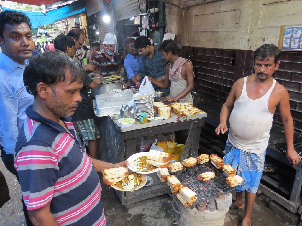 Serving Attendants at Chitto Babur Dokan (Deckers Lane, Kolkata, India)