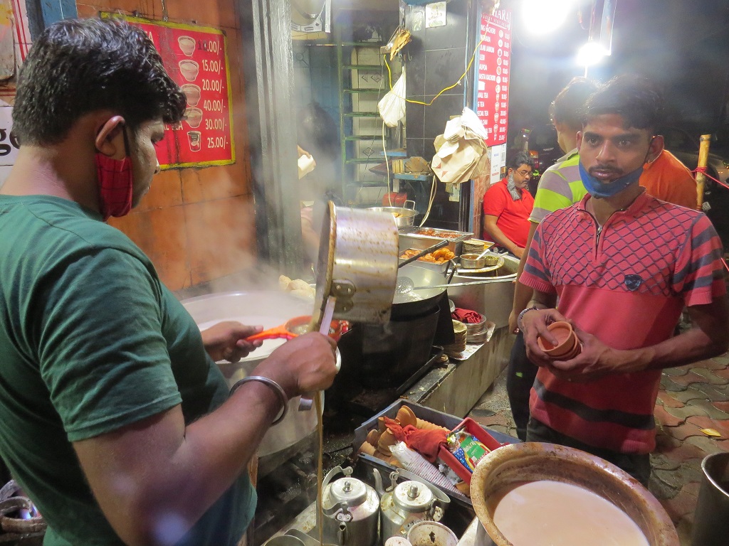 Worker Pouring Tea at Maharaj Tea & Snacks (Kalighat, Kolkata, India)