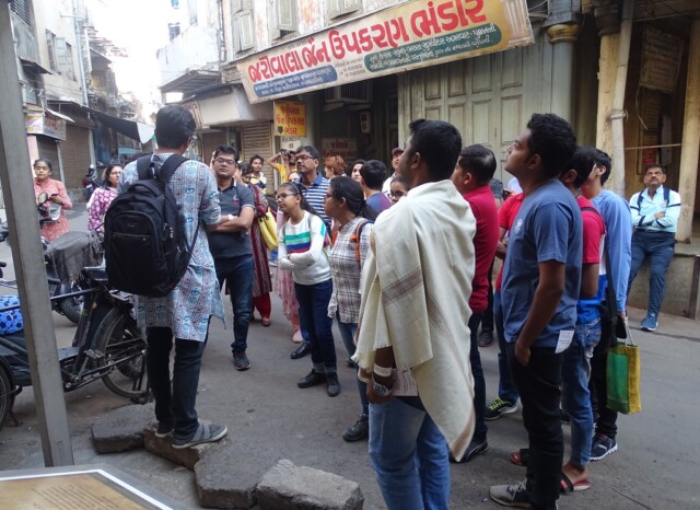 Tourist during Ahmedabad (Gujarat, India) Morning Heritage Walk with Professional Tour Guide