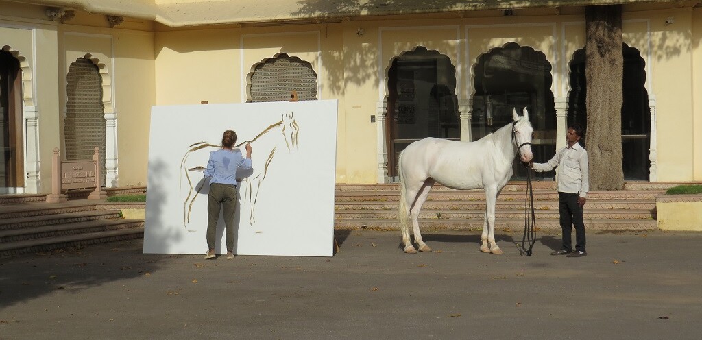 Woman Painting on Canvas