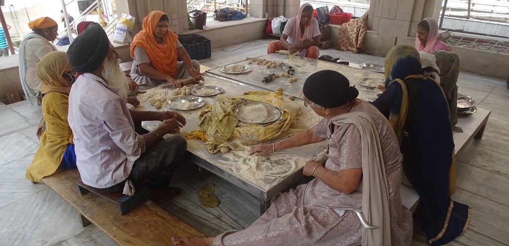 Volunteers Preparing Rotis at Langar (Community Kitchen) of Gurudwara Sis Ganj Sahib (Chandni Chowk Road, Old Delhi, India)