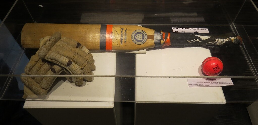 Lance Cairns (New Zealand) Cricket Bat & Batting Gloves (‘Blades of Glory’ Cricket Museum in Pune, Maharashtra)