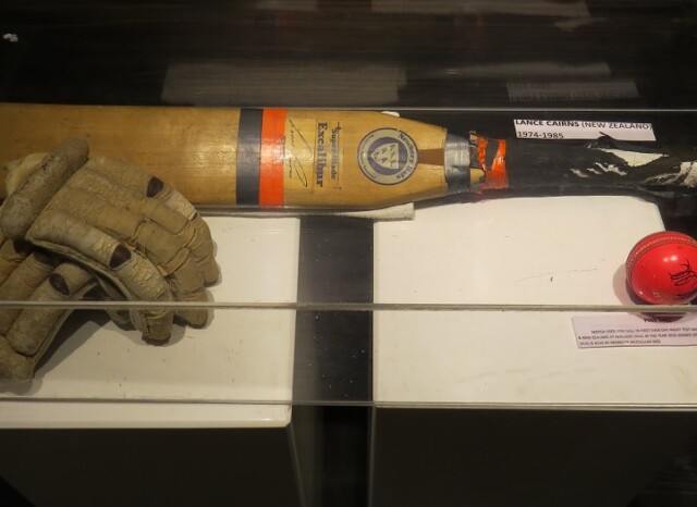 Lance Cairns (New Zealand) Cricket Bat & Batting Gloves (‘Blades of Glory’ Cricket Museum in Pune, Maharashtra)