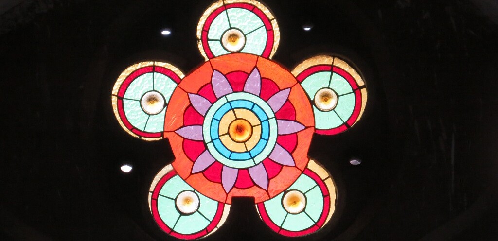 Colorful Stained-Glass Porthole Window at CST in Mumbai (Maharashtra, India)