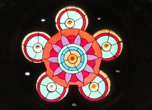 Colorful Stained-Glass Porthole Window at CST in Mumbai (Maharashtra, India)