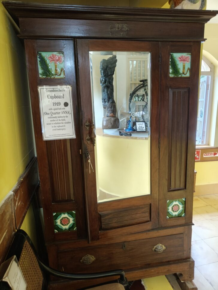 Grandmother's Cupboard 1929 with a Good Luck Coin at San Thome Museum – Back in Time, Varca, Goa (India)